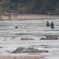 This June 14, 2010 file photo shows search and rescue crews searching the Little Missouri River.