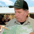 John Nichols of the U.S. Forest Service points to areas around the Albert Pike Campground Tuesday af...