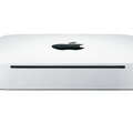 Apple Inc. introduced a redesigned Mac Mini Tuesday, raising the price of its least-expensive Macint...