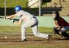 Fayetteville Lindsey’s Levi Copher bunts the ball against Fort Smith Kerwins on Tuesday in Fayetteville.