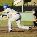 Fayetteville Lindsey’s Levi Copher bunts the ball against Fort Smith Kerwins on Tuesday in Fayettevi...