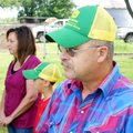 Kent and Carol Swinney and youngest son Brandon, 8, entertain family, friends and media Tuesday in t...