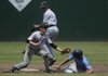 Fayetteville’s Carson Shaddy tags out Springdale Har-Ber’s Logue Chancellor at second base Tuesday in Fayetteville.