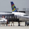 FILE - In this file photo taken June 13, 2010, a Spirit Airlines airplane sits on the tarmac at Fort...