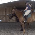 Beverley Bartley instructs riders, from left, Janelle Jessen, Erin Shanahan, and Connie Doyle at LaD...