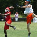  Rogers Heritage’s Jason Alderson, right, has a pass deflected by Magnolia’s Brandon Runyon during t...