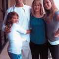 Mike Comley stands with his daughter, Haley, left, his mother, Peggy Comley, and his sister, Rachel ...