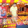 Josh McKee, left, and Kirk Glines look through an assortment of firecrackers and other recreational ...