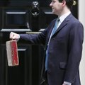 George Osborne, U.K. chancellor of the exchequer, holds the Gladstone dispatch box containing the em...