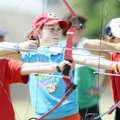 Ashtyn Mondy, 12, lines up her shot during an archery program Monday at J.B. Hunt Park in Springdale...
