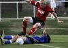 Fayetteville’s Brandon SIkes tangles with Little Rock Lutheran’s Jeremy Tashizdeh during the Arkansas High School Coaches Association All-Star Boys Soccer Match on Tuesday at Razorback Field in Fayetteville.