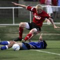 Fayetteville’s Brandon SIkes tangles with Little Rock Lutheran’s Jeremy Tashizdeh during the Arkansa...