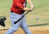 West All-Star Spanky Purdy of Rogers Heritage swings at a pitch during the first of two Arkansas High School Coaches Association All-Star Baseball Games on Tuesday in Baum Stadium in Fayetteville.