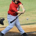 West All-Star Spanky Purdy of Rogers Heritage swings at a pitch during the first of two Arkansas Hig...