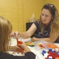 Melissa Todd, a second-grade teacher at Lowell Elementary School, works Wednesday with a student in ...