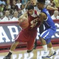 Fayetteville’s Kikko Haydar drives to the lane Thursday during the Arkansas High School Coaches Asso...