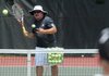 Paul Pautsch runs drills Thursday during the Cancer Challenge Junior Tennis Clinic at Kingsdale Tennis Complex in Bella Vista.