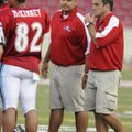 West assistant coaches Chris Wood, left, of Springdale Har-Ber and Bill Harrelson, right, of Gravett...