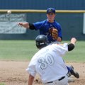 Fayetteville Lindsey’s Adam Baker, top, throws to first to turn a double play as Texarkana (Texas) r...