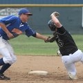  Rogers’ Reed Brown tags out a Texarkana, Texas, runner trying to steal second Saturday during the F...