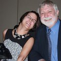 Arkansas Support Network Chief Executive Officer Keith Vire talks with Gala of Stars guest speaker K...