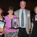 Single Parent Scholarship recipient Melissa McKee, from left, visits with Jan and Phil Butin and Kri...