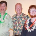 Walton Arts Center Volunteer Coordinator Mel Phillips, center, talks with volunteers James Minyard, ...