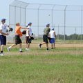 Members of the Physicians Specialty Hospital Wildcats baseball team practice on the field June 3 at ...