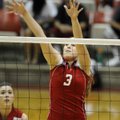  West player Haley Martin of Fayetteville blocks a shot by the East’s Bethany Gunn during the Arkans...