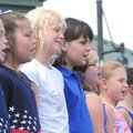 Children in the Bentonville First Baptist Praise Choir rehearse a song about the Pledge of Allegianc...
