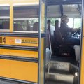 Dale Shouse checks his passengers before starting his route Friday at T.G. Smith Elementary School i...