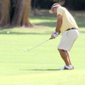 Jack Myers chips onto the No. 17 green during the Lost Springs Golf & Athletic Club men’s championsh...