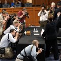 Supreme Court nominee Elena Kagan waves as she arrives on Capitol Hill in Washington, Wednesday to c...