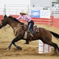 Rachel Holt competes in the slack in barrel racing Tuesday at the 66th Annual Rodeo of the Ozarks in...
