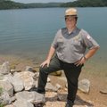 Army Corps of Engineers park ranger Alan Bland fishes, hunts, swims and works on Beaver Lake.