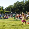 Kristen Gemeiner of Fayetteville dances Wednesday with her 3-year-old daughter Makayla as the two en...