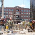 Workers with Lithko Contracting of Catoosa, Okla., and Liberty Steel in Fort Worth, Texas, build con...