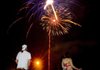 Ted and Shawn Morris of Bella Vista watch the Fourth Fest fireworks in 2007 at Memorial Park in Bentonville.
