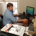 Jeff Collins works in 2008 at his office in Johnson, where he operates Streetsmart Data Services LLC...