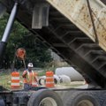 Construction continues Tuesday on Mount Comfort Road in Fayetteville. The improvement project is due...