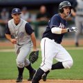 Northwest Arkansas’ Mike Moustakas and Corpus Christi first baseman Koby Clemens watch Moustakas’ RB...