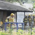 Springdale firefighters respond Tuesday to a house fire at the intersection of Westwood Avenue and C...