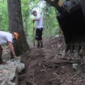 David Renko, left, of Sweet Trails, and Cory West of Progressive Trail Design, work on a multiuse tr...