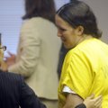 Shelly Ramirez, right, consults with her attorney, Kao Lee, while pleading guilty to theft by decept...