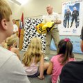 Marine biologist Wayne Brown of Irvine, Calif., demonstrates how to use an underwater scooter Wednes...