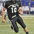 SUMMER SCRAMBLE Bentonville quarterback Pearson Gean scrambles for yards against Conway on Sept. 4 i...