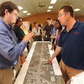 ROAD TALK -  Bud Schwartz of Fayetteville, right, speaks Thursday with Mark Earl, roadway designer f...
