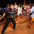 DANCE DIVERSITY - Kouakou “Angelo” Yau, right, a native of the Ivory Coast and member of the group A...