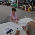 NUTRITION PROGRAM - Frankie Sutterfield signs up for the Senior Farmers Market Nutrition Program on ...