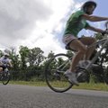Cyclists bike down the Scull Creek trail in Fayetteville during the Fourth of July weekend.
